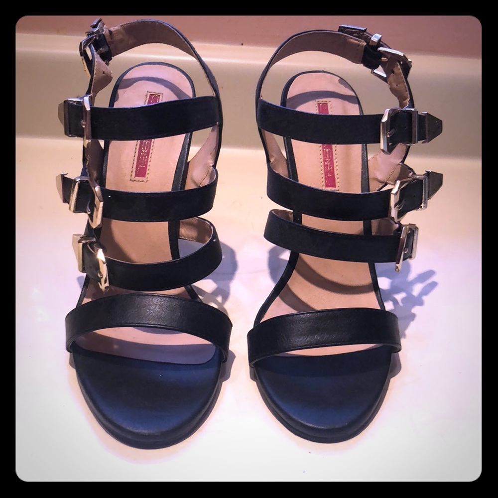 Black and gold strappy heels